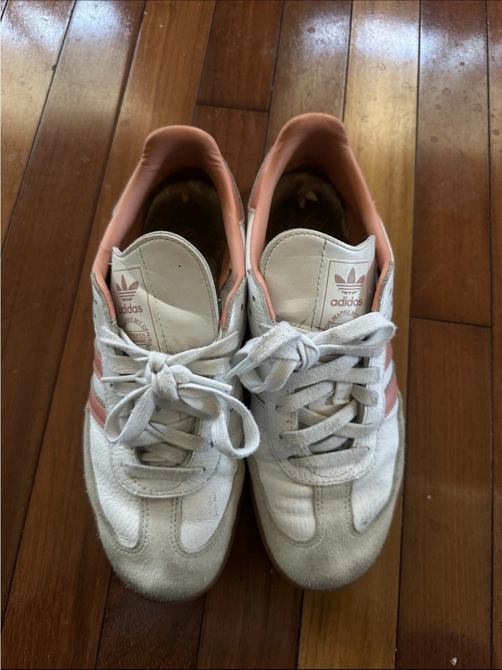 adidas Women's White Sneakers with Peach Accents-well worn